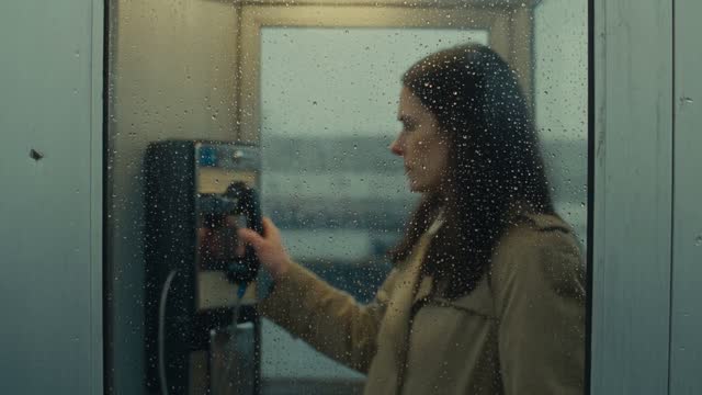 Woman Investigates a Ferry During a Storm